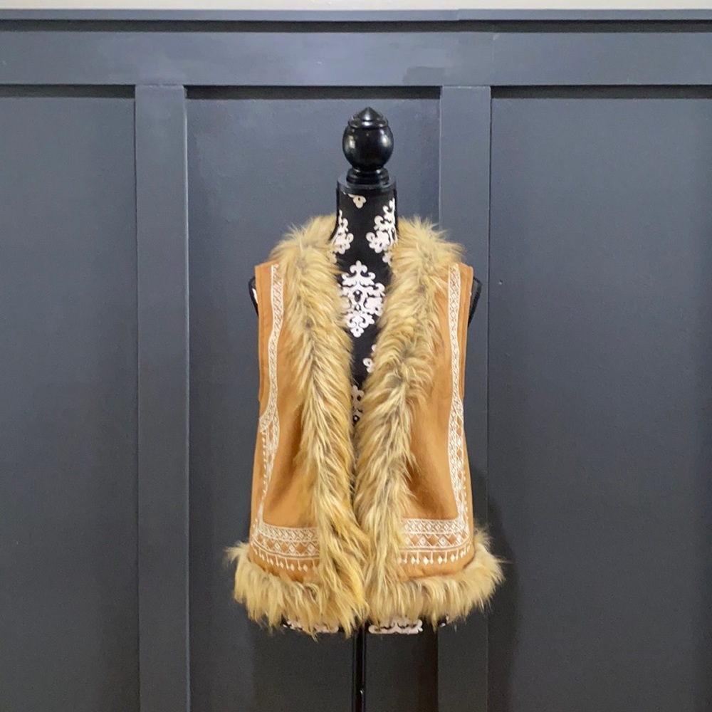 Buckle 70s inspired hippie vest!